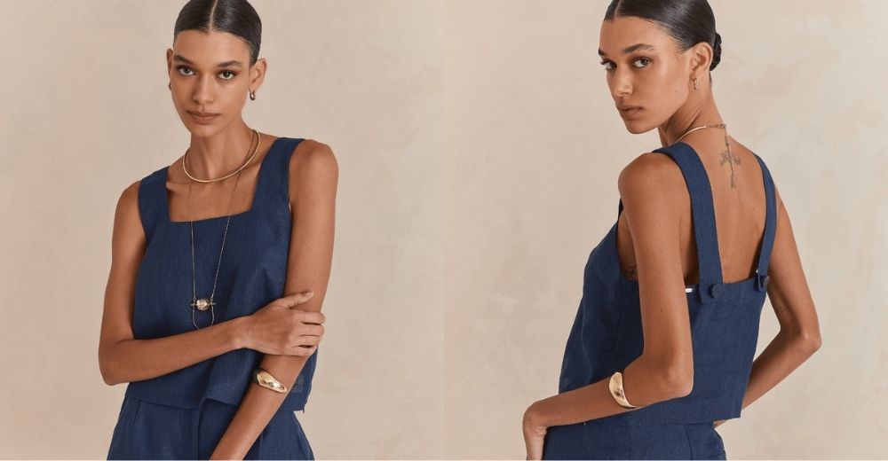 Mulher usando vestido de tecido leve para o verão, ideal para dias quentes, combinando conforto e estilo em tom azul.